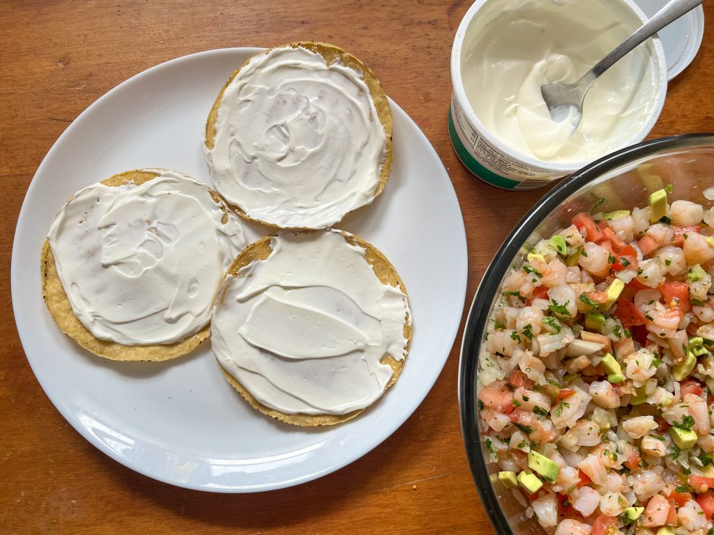plasted tostadas topped with sour cream